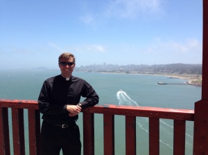 A picture from the Golden Gate Bridge with San Francisco in the background.